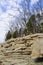 Layered stones on the shore of a forest lake in the state of Tennessee