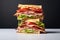 Layered tall club sandwich on the white