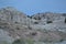 Layered white, gray hills in New Mexico under blue sky