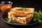 layering paneer butter masala in a buttered sandwich