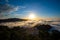 Layers of surging clouds are very spectacular. Sunset behind the mountains.