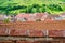 Layers of traditional house roofs in Biertan, Transylvania, Romania. Scenic view from the upper walls of Biertan Fortified Church