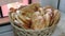 Laying baked Uzbek tortillas in a wicker basket Bakery products national traditional dishes