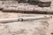 Laying paving slabs close-up. Road surface, construction. Sidewalk repair. Worker laying stone paving slab. Laying tiles