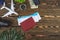 Layout of airplane travel accessories on a wooden background. Top view