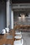 Layout in a loft style in dark colors open space interior view of various coffee Welcome open coffee shop background