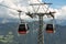 Laysin`s gondola cabins on the top of Berneuse and view on Alps, Switzerland