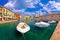 Lazise colorful harbor and boats panoramic view