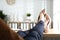 Lazy worker with feet on desk in office