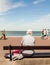 Lderly male tourists sitting on a bench exhausted