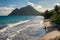 Le Diamant Beach in Martinique, with young man playing with a ba