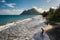 Le Diamant Beach in Martinique, with young man playing with a ba