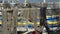 Le Grau-du-Roi, France fishing net hanging to dry with colorful fishing boats in background; Fishin Industry