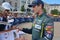 LE MANS, FRANCE - JUNE 11, 2017: Austrian race car driver Mathias Lauda Aston Martin Racing in the uniform gives autograph during