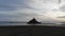 Le Mont Saint-Michel tidal island in beautiful twilight at sunset and clouds, Normandy, France. aerial view in low tide. Beautiful