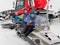 Lead sit on a snowmobile on a snow slope