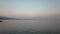 Leadbetter beach Santa Barbara and flight towards rising moon