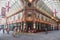 Leadenhall covered market interior with tourists in bicycle