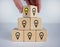 Leader with idea and innovation. Man hand flips cube with icon light bulb. Business concept