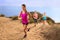 Leader jogger running uphill extreme workout fitness in shape weight loss exercise team row modern