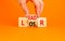 Leader or loser symbol. Concept word Leader Loser on wooden cubes. Beautiful orange table orange background. Businessman hand.