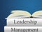 Leader Versus Manager Books Depicts Supervising Vs Leading - 3d Illustration