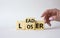 Leader vs Loser symbol. Businessman hand points at wooden cubes with words Loser and Leader. Beautiful white background. Leader vs