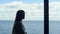 Leader woman silhouette thinking sea panorama window. Business lifestyle concept