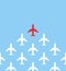 Leadership concept. One red leader airplane leads other white airplanes forward. Red and white airplanes. Motivation