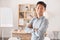 Leadership, portrait and young Asian businessman standing in creative workspace. Success, startup and man with
