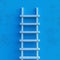 Leadership success concept ladder achievement on blue wall background