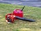Leaf air blower and gas can on a residential grass lawn