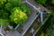 Leaky roof of an abandoned building in the forest from the air