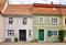 Leaning roofs on a renovated semi detached house with historic windows and doors in the old town of Wismar