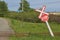 Leaning stop sign and railroad crossing in rural Nova Scotia