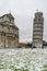 The leaning tower and Duomo after a snowfall, Piazza dei Miracoli, Pisa, Tuscany, Italy