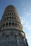Leaning Tower of Pisa with bluwe sky and more clouds