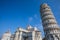 The Leaning Tower of Pisa, campanile, or freestanding bell tower, of the cathedral of the Italian city of Pisa. Blue sky