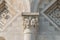 Leaning Tower of Pisa: detail of a capital depicting two demons bound by a monstrous creature