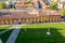 Leaning Tower of Pisa view: Fallen Angel Angelo Caduto and the Lupa Capitolina Capitoline Wolf monuments