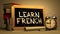 Learn French - Motivational Quote on Chalkboard