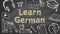 Learn German. Illustration on blackboard.