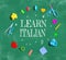 Learn Italian theme with school supplies on a chalkboard