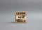 Learn new skills symbol. Concept words Learn new skills on wooden blocks. Beautiful grey background. Business and Learn new