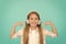 Learn song lyrics. Clear sound. Girl child listen music with modern headphones. Kid little girl listen music headphones