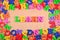 Learn written by plastic colorful letters