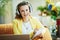 Learner woman with headphones interactive learning online