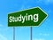 Learning concept: Studying on road sign background