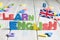 Learning speaking and teaching english with british flag abstract background concept