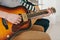 Learning to play the guitar. Music education and extracurricular lessons. Hobbies and enthusiasm for playing guitar and